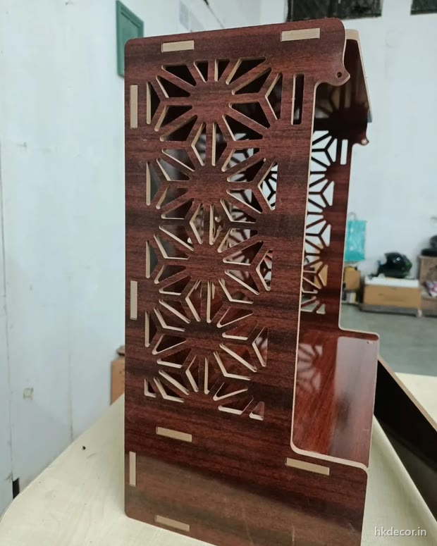 Laser cut home mandir with perforated jaali side panels in a dark wood finish