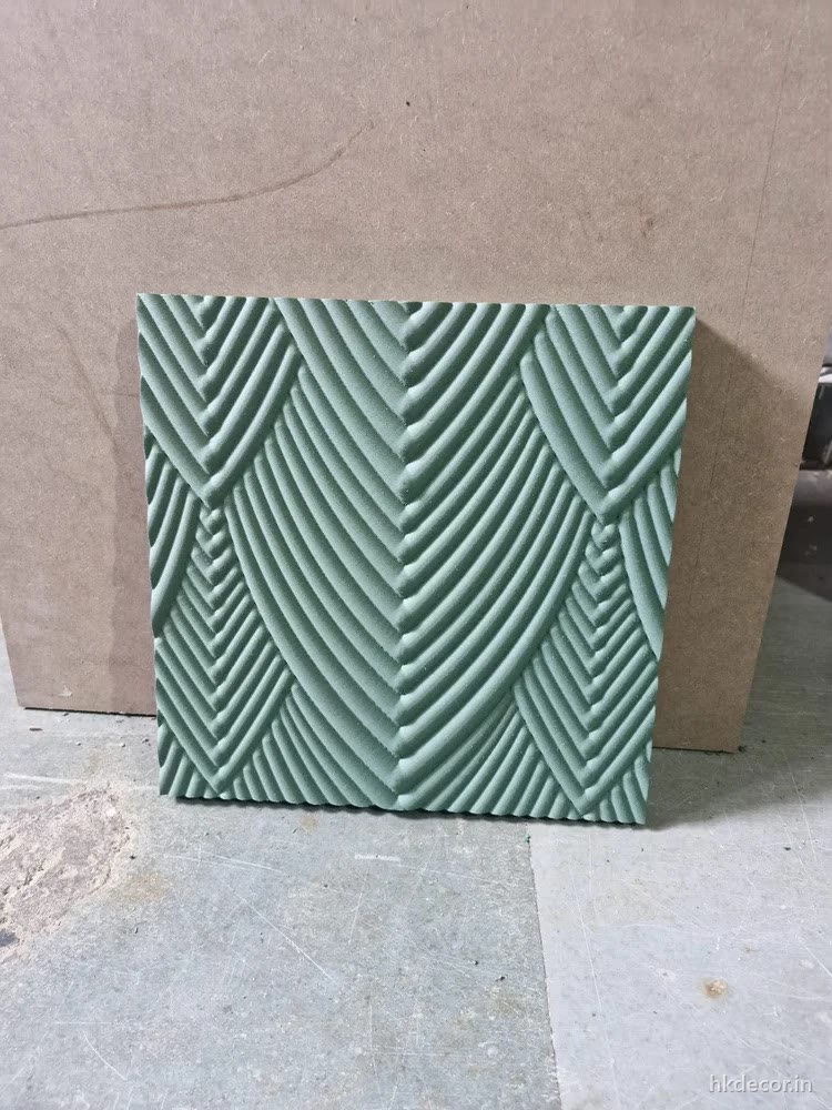 CNC cut fluted panel with grooves mitred into a chevron, primed MDF