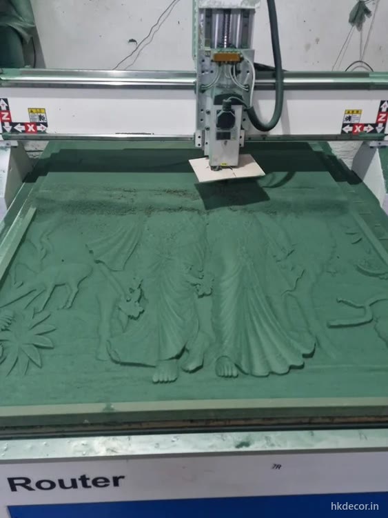 CNC router carving a figurative relief to depth on the bed at Dream3 Bijwasan